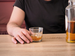 person holding a glass of beer