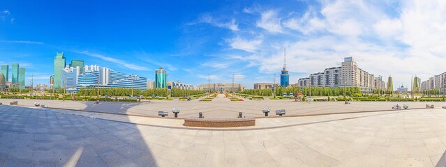 Fototapeta na wymiar Panoramic picture of downtown Kazakhstan city Astana with its modern buildings during the day