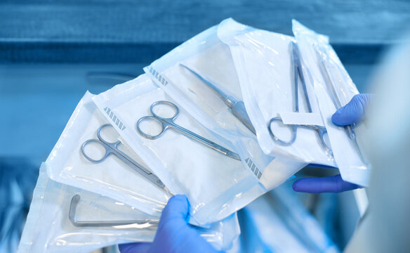 Packaged dental products in sealed sealed packaging. The concept of sterilization and disinfection in a dental clinic.