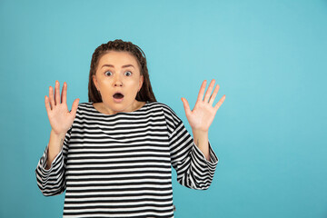 I'm afraid. Fright. Portrait of the scared woman. Business woman standing isolated on trendy studio...