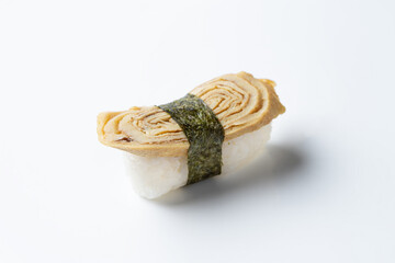 One single eel sushi roll, isolated on white background, macro shot