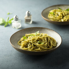 Traditional homemade pasta with pesto sauce