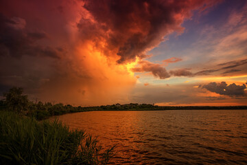 Fototapeta na wymiar Beautiful landscape with sunset, sunrise on the lake