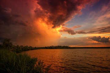 Beautiful landscape with sunset, sunrise on the lake