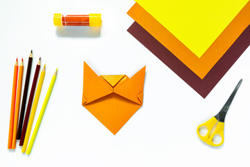 Instruction step by step origami tiger. Children's craft