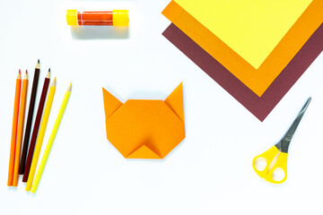 Instruction step by step origami tiger. Children's craft