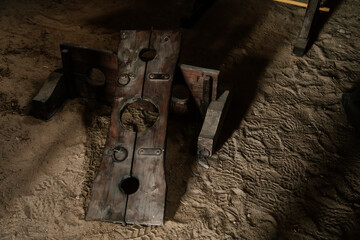 Vintage medieval Torture Equipment in museum, Rack, break-knee, Torture chamber in medieval gothic...