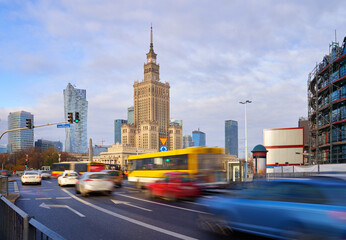 High traffic near the Palace of Culture and Science in Warsaw, Poland. Long exposure shot of city...