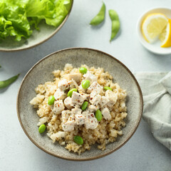 Healthy quinoa bowl with chicken and edamame beans