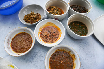 A variety of African local soups on display