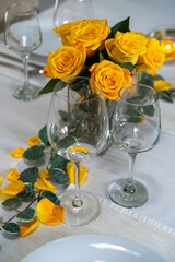 Table design for dinner. A romantic table decorated with roses.