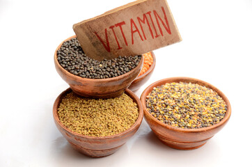 closeup pulse red lentils,black gram, greek ,forest pulse,write vitamin health care medical concept isolated on white background.