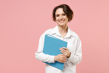 Young successful employee business secretary woman corporate lawyer in classic formal white shirt work in office blue folder for papers document bookkeeping isolated on pastel pink background studio.