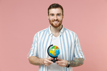 Young geography teacher student smiling caucasian unshaven man 20s wearing blue striped shirt whote...