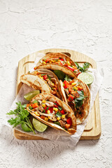 tacos with grilled chicken meat and veggies