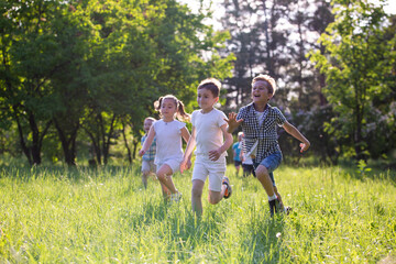 children play outdoors running and having fun
