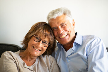 Close up older couple smiling together