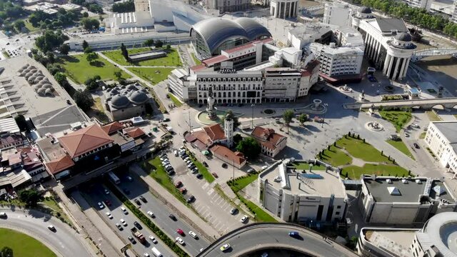 A panoramic drone view of the city of Skopje in northern Macedonia. Drone view of the stone bridge over the Vardar River. The central square in Skopje from above.