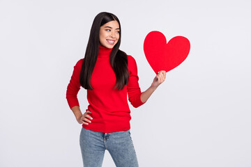 Photo of happy cheerful good mood woman look big red heart valentine day date isolated on grey color background