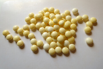 Plenty of small round yellow xylitol mints