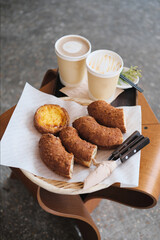Crispy bakery and egg tart with hot coffee, Seoul, South Korea