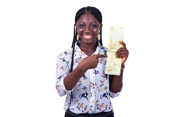 beautiful young happy tourist woman pointing finger on paper map.