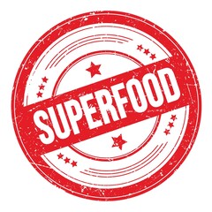 SUPERFOOD text on red round grungy stamp.