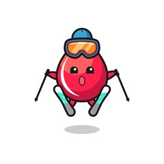 blood drop mascot character as a ski player