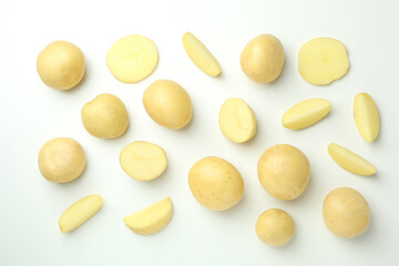 Fototapeta na wymiar Tasty young potato on white background, top view