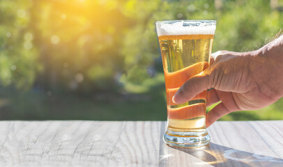 The concept, International Beer Day (IBD) is a celebration on the first Friday of every August founded in 2007 in Santa Cruz, California by Jesse Avshalomov. Closeup, Copy space, Blurred background