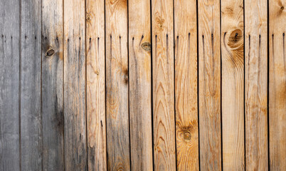 Close up gray wood fence paneling, wood pattern texture background, wood planks.