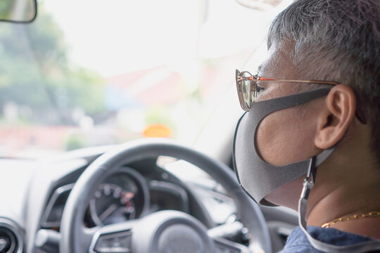 New Normal Lifestyle, Asian Smart Seniors Woman Driving Car With Sunglasses On Highway With Masks Prevent COVID-19 Virus, Older  Tourist Driving Car Travel, Lifestyle Traveler Holiday By Road