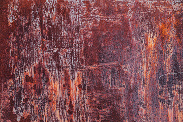 Aged rusty weathered background with cracks, scratches and spots or grunge rough surface metal backdrop.