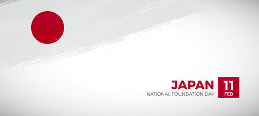 Happy national foundation day of Japan with brush painted grunge flag background