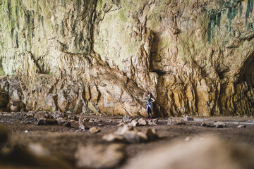 Traveler girl discovery a devetashka cave near lovech