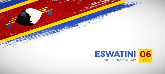 Happy independence day of Eswatini with brush painted grunge flag background