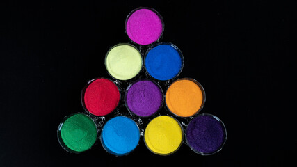 Perfect Triangle of Colors in Glass With Top View Isolated in Black Background