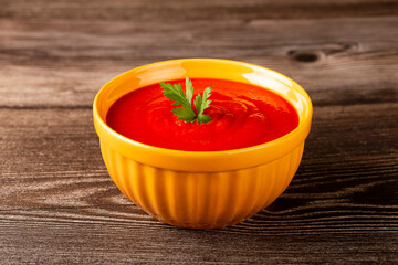 Delicious homemade tomato soup in bowl.