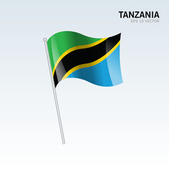 Tanzania waving flag isolated on gray background