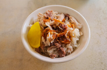 Taiwanese chicken rice with pickled radish.