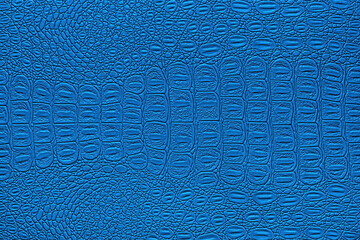 Blue crocodile leather texture. Abstract backdrop for design.