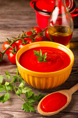 Delicious homemade tomato soup in bowl.