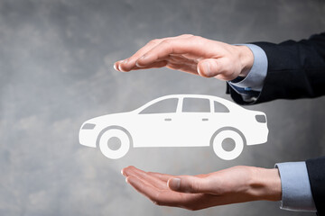 Digital composite of Man holding car icon.Car automobile insurance and car services concept....