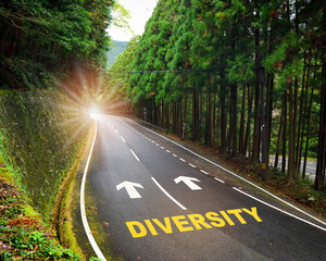 Diversity and arrow marking on highway road and white marking lines in the forest. Opportunity and decision concept and success with direction idea