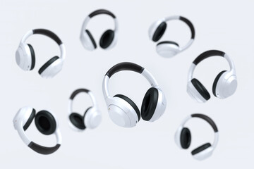 Obraz na płótnie Canvas Flying gamer headphones or headset on white background with blur