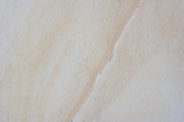 Stone marble slate wall background in warm tones and sharp detail