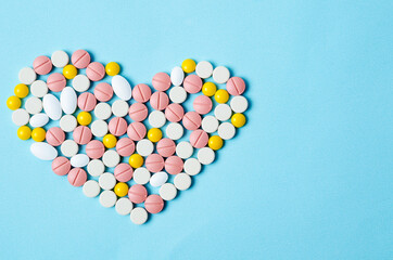 Many colorful pills macro.