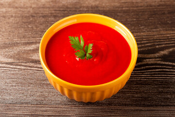 Delicious homemade tomato soup in bowl.