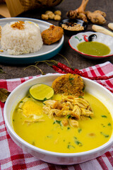 Nasi Soto Ayam or Soto Medan is  Traditional chicken soup with rice from Medan, North Sumatra. 

Soto is a traditional Indonesian soup mainly composed of broth, meat, fried patties and vegetables.