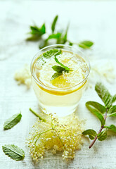 Homemade Elderflower-Ginger Lemonade with Mint leaves. Healthy summertime drinks
